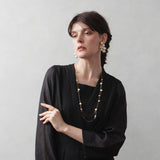 Cotton pearl twin station necklace