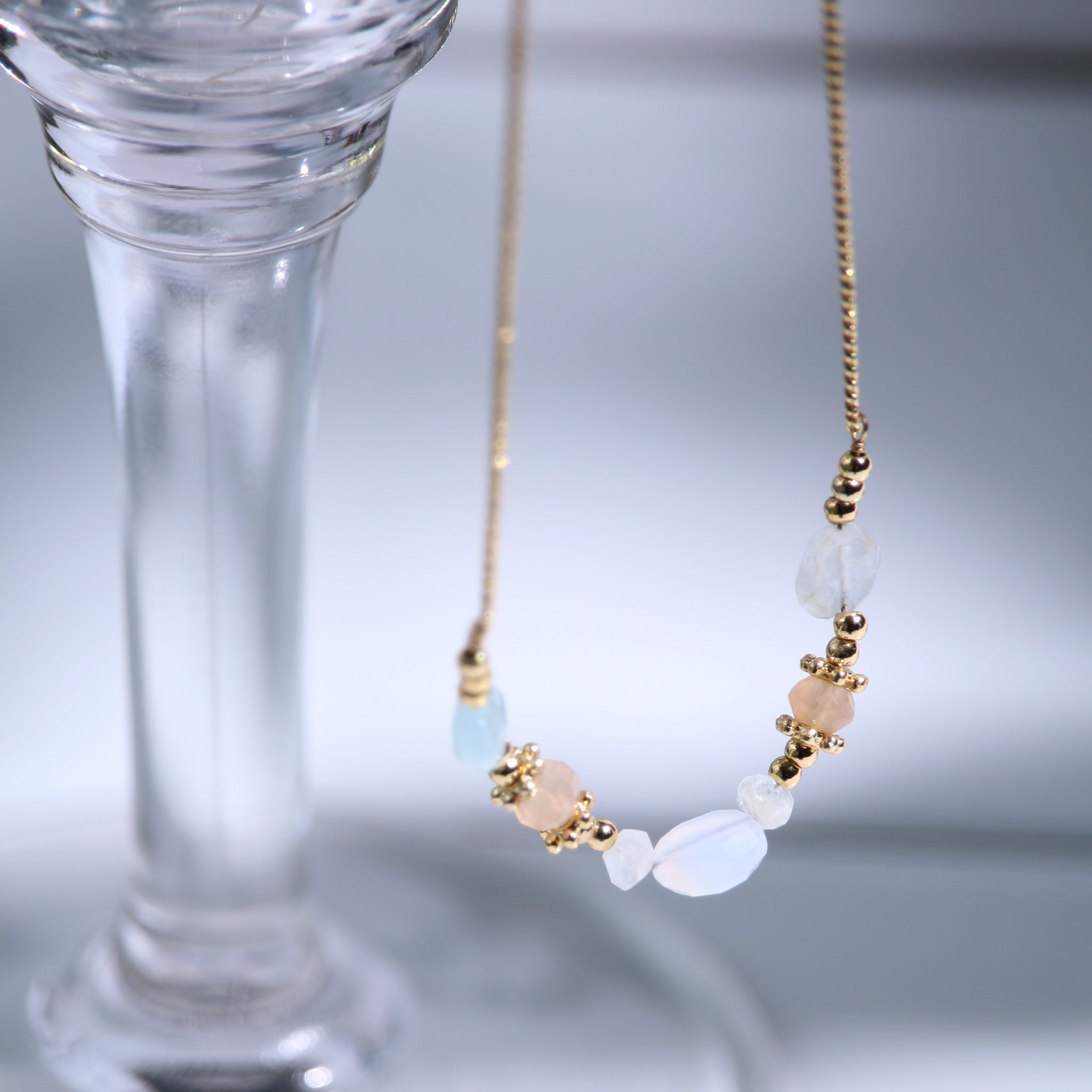 Motif necklace of White Calcedney and White Moonstone