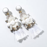 Pom pomotif x tassel earrings