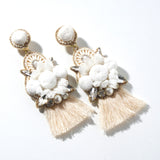 Pom pomotif x tassel earrings