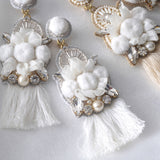 Pom pomotif x tassel earrings