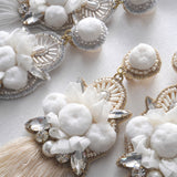 Pom pomotif x tassel earrings