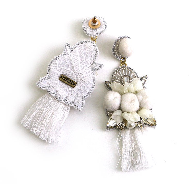 Pom pomotif x tassel earrings