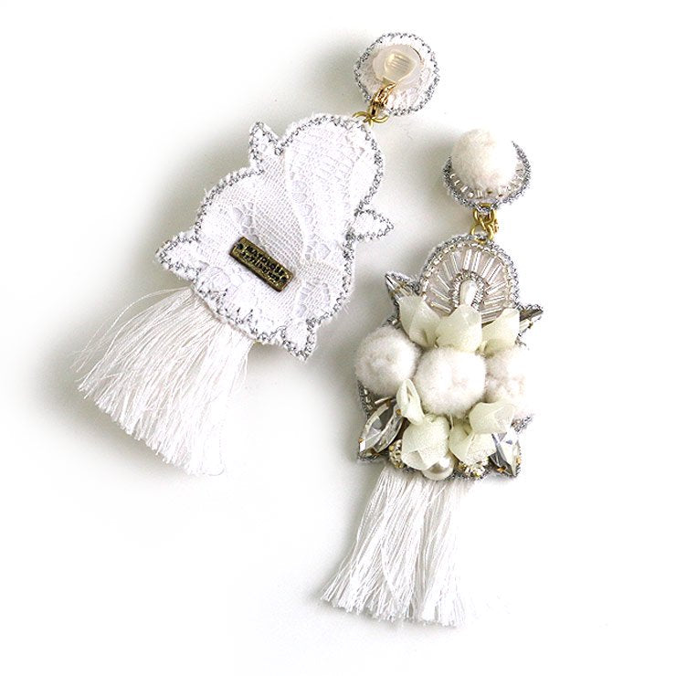 Pom pomotif x tassel earrings