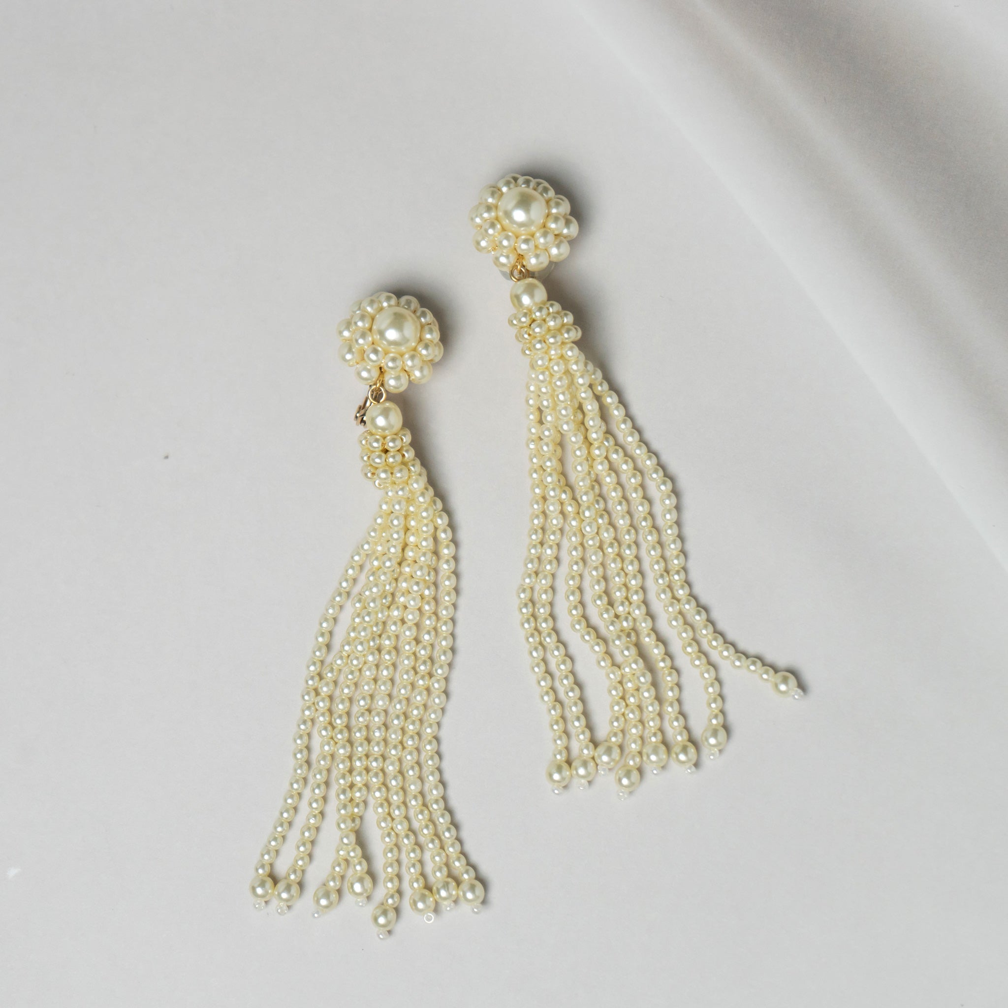Long earrings for pearl flowers and tassel