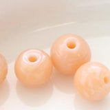 ガラスビーズ ラウンド型 6mm ピンクベージュ 6個入（5セット入り）